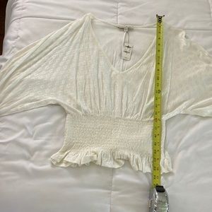 Express cream colored top size small NEW